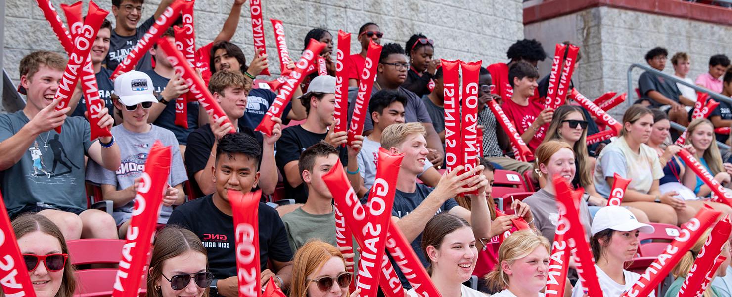 Students cheering at soccer game